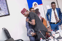 Stonebwoy during his official signing at Zylofon Media