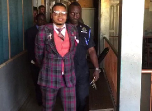 Bishop Daniel Obinim in handcuff