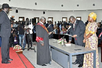 Riek Machar with his wife Angelina Teny as he takes the oath of office