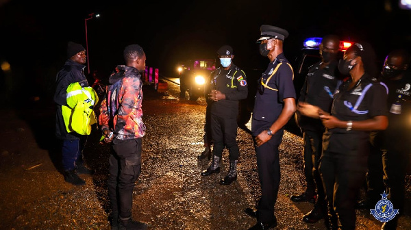 Acting IGP Dampare with his men during the tour