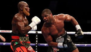 Daniel Dubois (right) sent Richard Lartey to the canvas with a powerful right hand