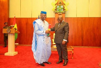 Dr. Edward Mahama being sworn-in as Ambassador by President Akufo-Addo