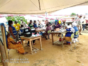 EC officials registering voters