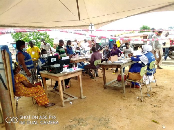 EC officials registering voters