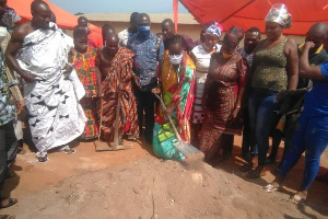 Naana Eyiah Quansah, Deputy Minister of Lands and Natural Resources cutting sod