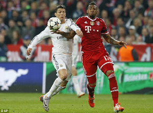 Jerome Boateng trying to outwit Cristiano Ronaldo.