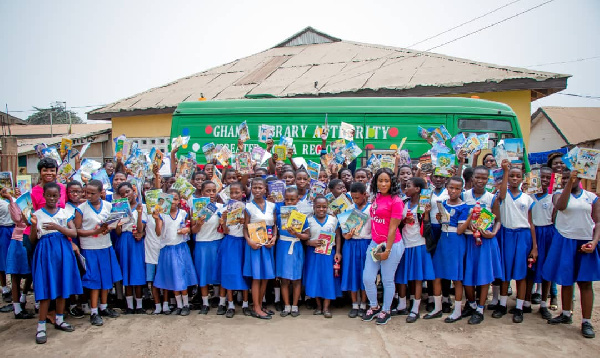 Some team members in a pose with the students