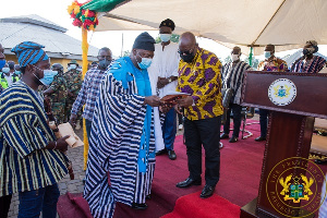 President Akufo Addo Receiving A Copy Of The Document On The Dagbon Development Fund From Alhassan A