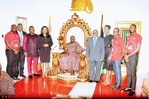 Asantehene Otumfuo Osei Tutu II in a group Photograph with Vodafone team