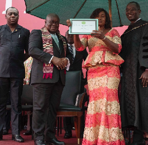 President Akufo-Addo, Mrs Omari with her son