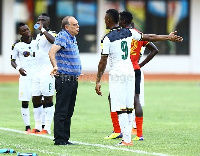 Ghana coach Avram Grant having a discussion with Jordan Ayew