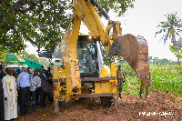 Vice President, Dr Mahamudu Bawumia cutting sod for the construction of 320 Housing units