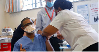 A healthcare worker receives the Johnson & Johnson vaccine at Khayelitsha hospital (Mike Hutchings)