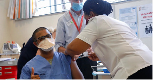 A healthcare worker receives the Johnson & Johnson vaccine at Khayelitsha hospital (Mike Hutchings)