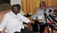 Rawlings (r) addressing the media in the presence of Akufo-Addo (l)