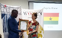 Nicholas Bortey receiving his award