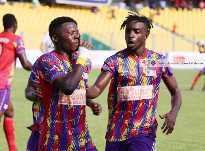 Hearts of Oak player, Salifu Ibrahim celebrating a goal with Fredrick Asnah Botchway