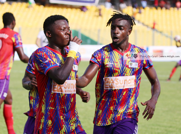 Hearts of Oak player, Salifu Ibrahim celebrating a goal with Fredrick Asnah Botchway