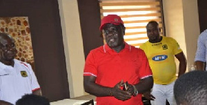 Executive Chairman of Kotoko Dr. Kwame Kyei in red