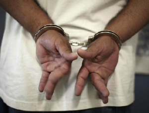 File Photo Of An Inmate In Handcuffs At The Orange County Jail In Santa Ana. Reuters