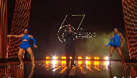 Rema with his dancers at the 2023 Ballon d'Or awards in France