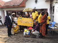 MTN Ghana presenting a cheque to support the 2019 Sanzule Kundum Festival