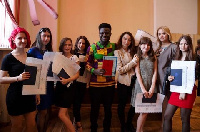 Abdul-Kadir Ameyaw with mates holding his Red Diploma (1st Class)