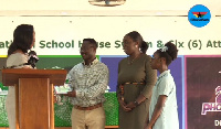 Nadia Bruce-Muller presenting the books to the reps of Pom-pom Library. Looking on is Ohemaa