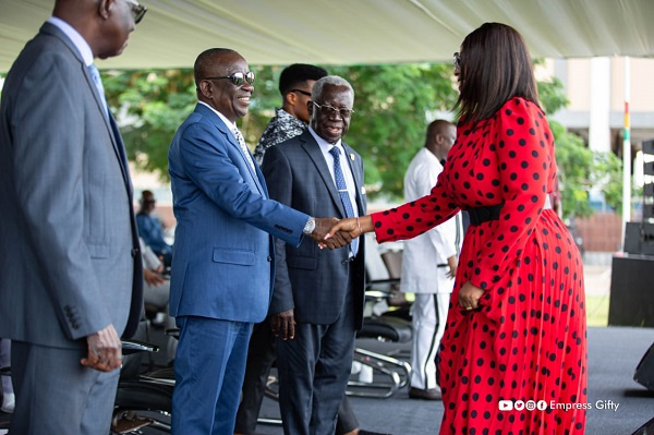 Empress Gifty shaking hands with Minister of National Security, Kan Dapaah