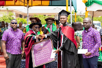 Seidu Joshua Adams receiving the prize