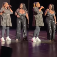 Sista Afia on stage with her mother