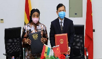 Madam Shirley Ayorkor Botchway, foreign minister, and Mr. Lu Kun, the Chinese Ambassador to Ghana.