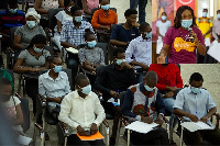 Priscilla Yeboah, Head of Citizenship at Absa Bank Ghana (inset) speaking to participants