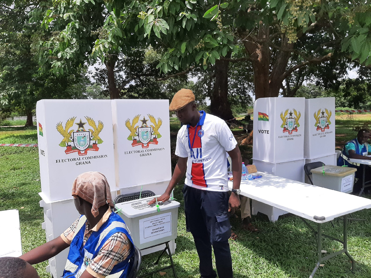 A voter casts their ballot in the process