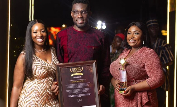 Mr Clottey and his team displaying the award