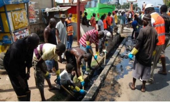 People cleaning their vicinity