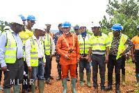 George Mireku Duker interacting with officials during the inspection