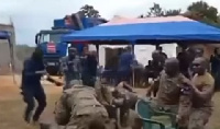 Soldiers dancing to the 'One Corner' music