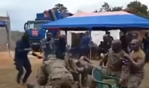 Soldiers dancing to the 'One Corner' music