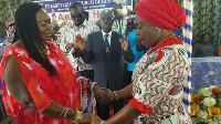 Tina Mensah (left) and Obuobia Darko praying together