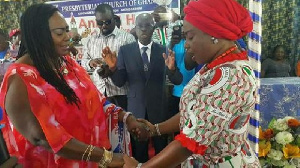 Tina Mensah (left) and Obuobia Darko praying together