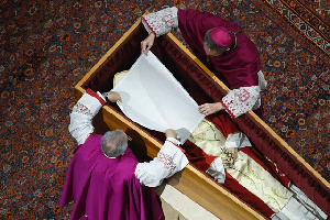 Pope Benedict's Coffin Being Covered