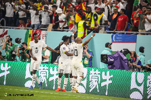 Dede Ayew celebrates scoring Ghana's equalizer