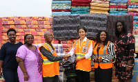 Tigo Ghana CEO, Roshi Motman donating the items