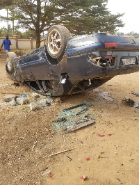 One of the vandalized vehicles in the roit by Krobea Asante Technical and Vocational School students