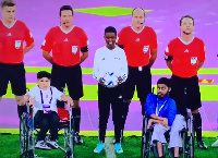 Dora Kukua Nyarko holding the ball during pre-match formalities at the 2022WC