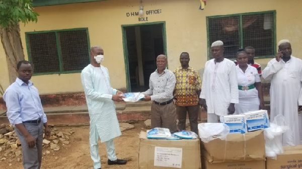 Alhaji Yussif Sulemana presenting the items on behalf of John Mahama