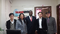 Executives of Investigroup LL with executives of  MFAR Group in a group photo