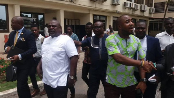 Anyidoho (in white shirt) walks freely since all treason charges against him have been dropped