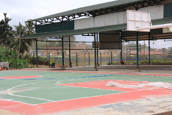 The basketball courts being prepared for handing over to the community